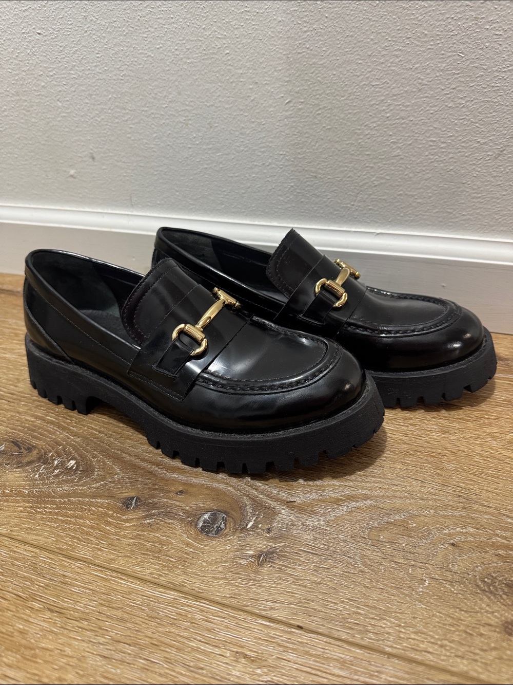Steve Madden Black Chunky Lug Loafers with Gold Bit Hardware